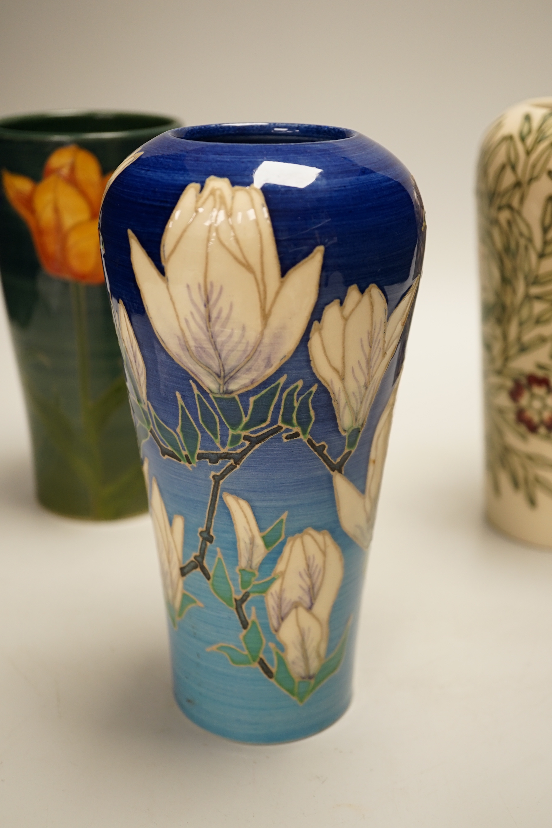 Sally Tuffin for Dennis China Works - three floral design vases, 20cm